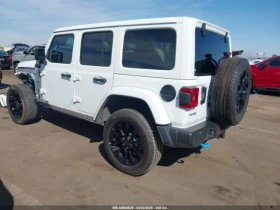 Jeep Wrangler 4XE SAHARA* КОЖЕН САЛОН  - 26300 € / 51438.33 лв. - 22058609 6