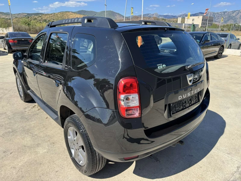 Dacia Duster 1.6* 105ps* НАВИ* FACE* КЛИМАТИК, снимка 3 - Автомобили и джипове - 51523768