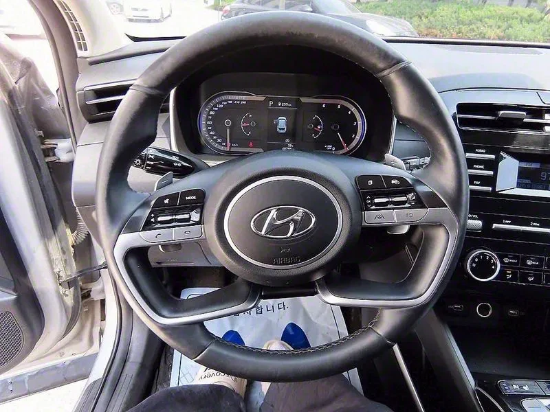 Hyundai Tucson 2.0 4Wd Modern, снимка 12 - Автомобили и джипове - 53367381