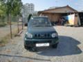 Suzuki Jimny 1,3i, снимка 1 - Автомобили и джипове - 15709696