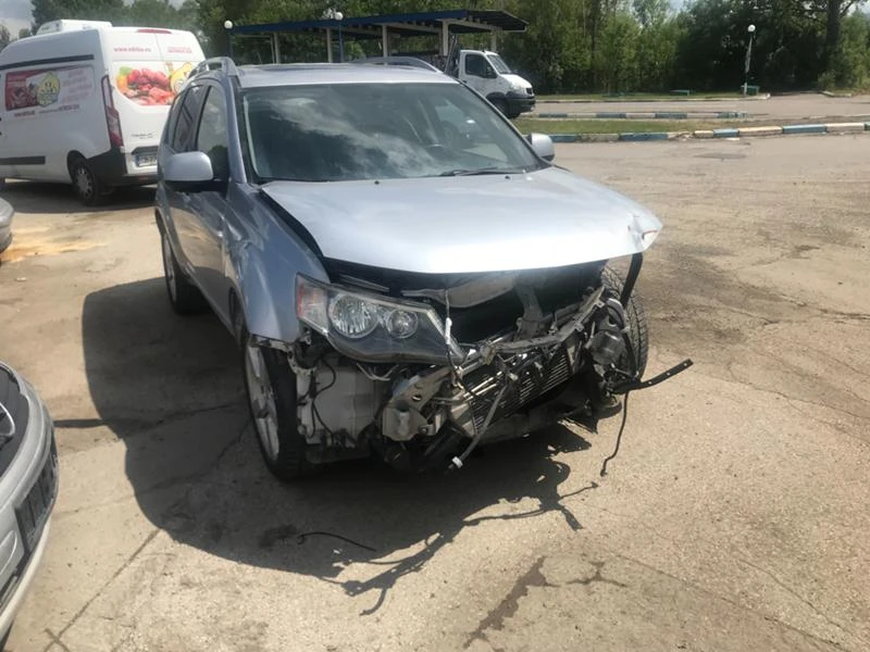 Mitsubishi Outlander 2.0tdi TIP-BSY, снимка 10 - Автомобили и джипове - 21605045