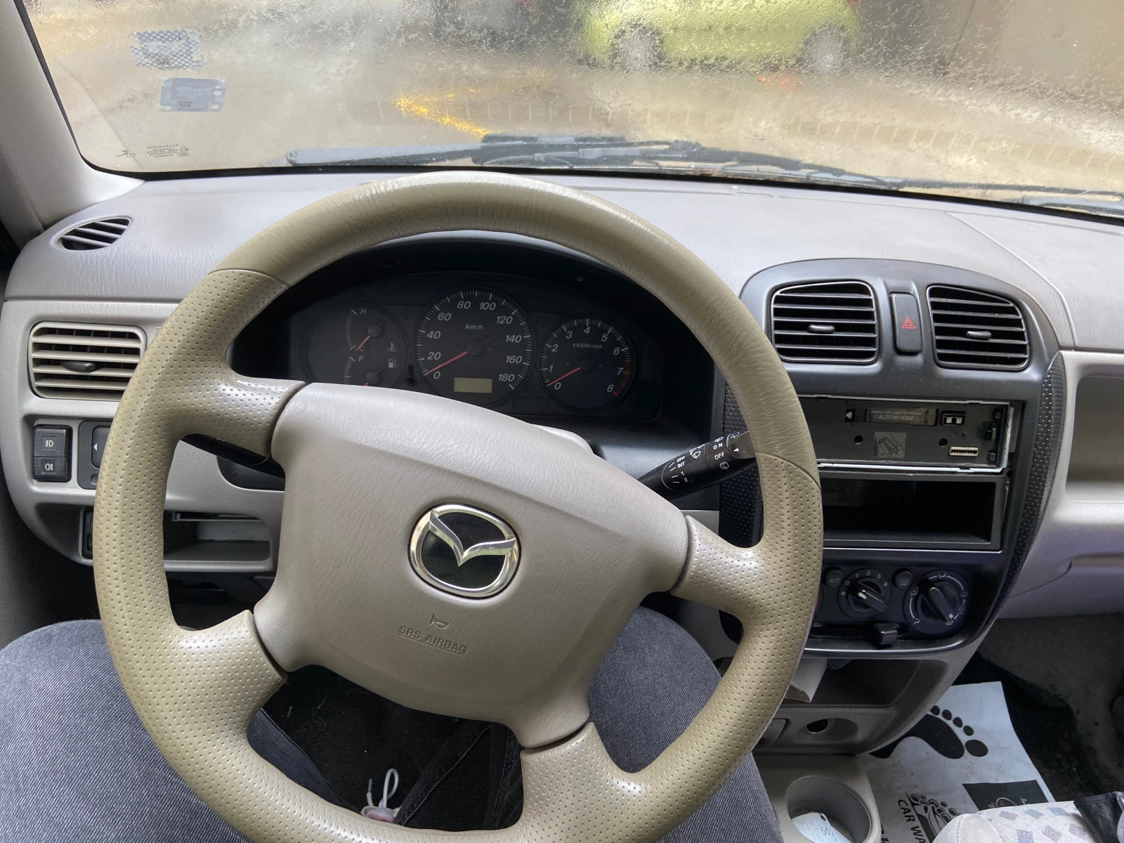 Mazda Demio 2000 - изображение 8