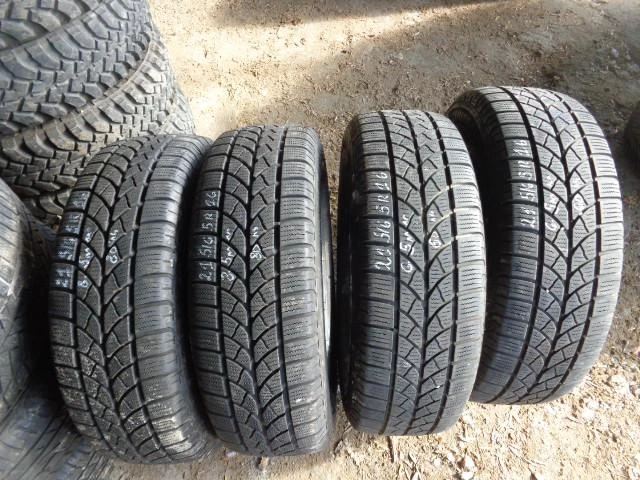 Гуми Зимни 215/65R16, снимка 15 - Гуми и джанти - 20871434