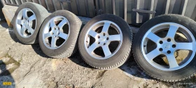 Гуми с джанти Hankook 205/55R16, снимка 1 - Гуми и джанти - 49097141