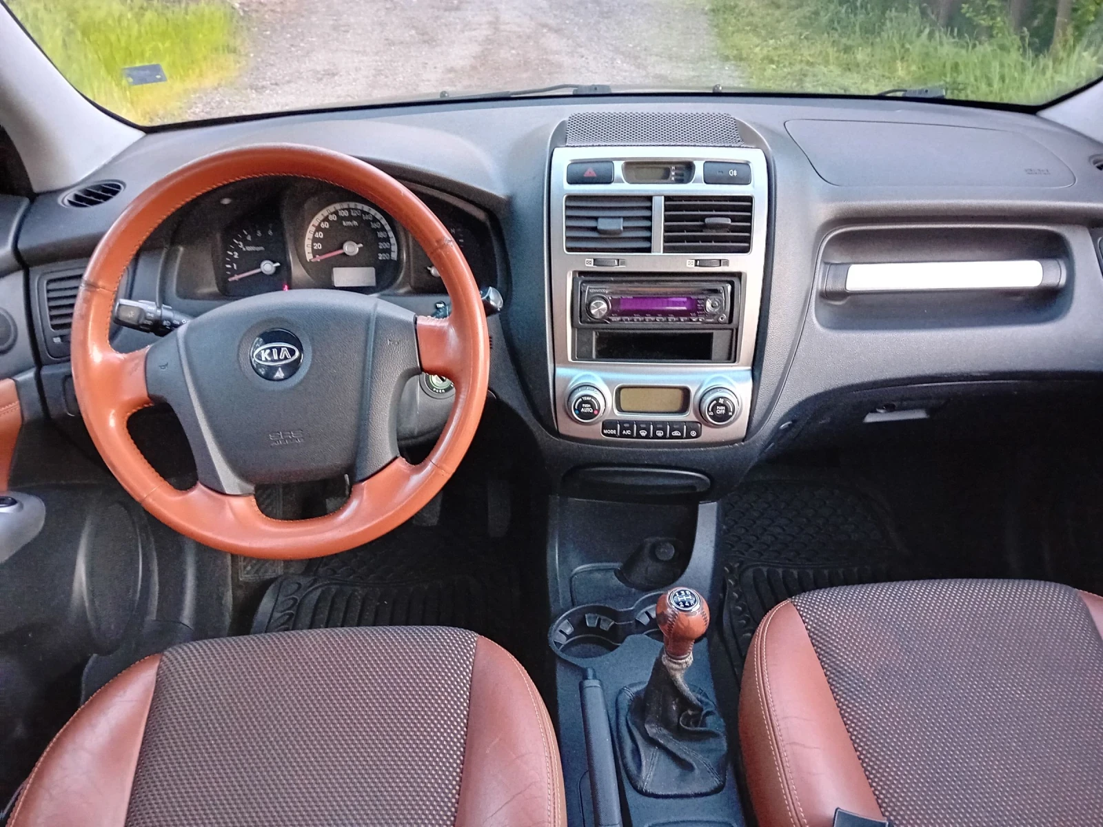 Kia Sportage 4х4 Кожен салон подгрев на седалки , снимка 9 - Автомобили и джипове - 54543751