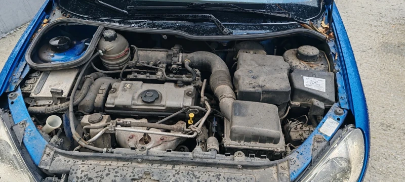 Peugeot 206, снимка 9 - Автомобили и джипове - 52338691