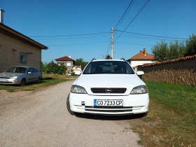 Opel Astra, снимка 1 - Автомобили и джипове - 45595901