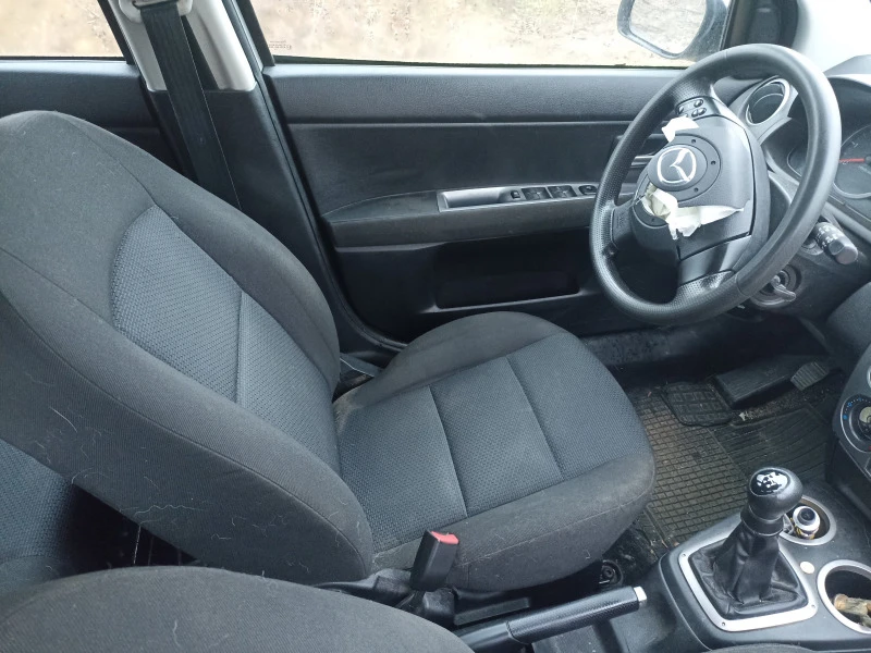 Mazda 2 1,4 TDCI, снимка 11 - Автомобили и джипове - 44016025