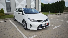 Toyota Auris 1.8i hybrid всички екстри за модела 100000км.!!!!! - 18500 лв. - 54354172 3