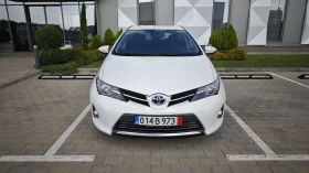 Toyota Auris 1.8i hybrid всички екстри за модела 100000км.!!!!! - 18500 лв. - 54354172 2