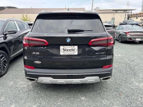 BMW X5 * xDrive40i * АМБИЕНТНО* ПАНОРАМА* + ГУМИ С ДЖАНТИ, снимка 4