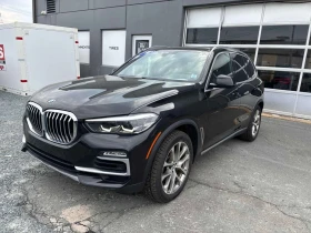 BMW X5 * xDrive40i * АМБИЕНТНО* ПАНОРАМА* + ГУМИ С ДЖАНТИ, снимка 1