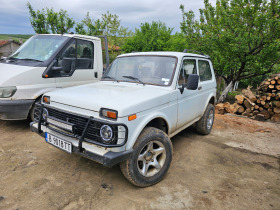 Lada Niva, снимка 1 - Автомобили и джипове - 45566574