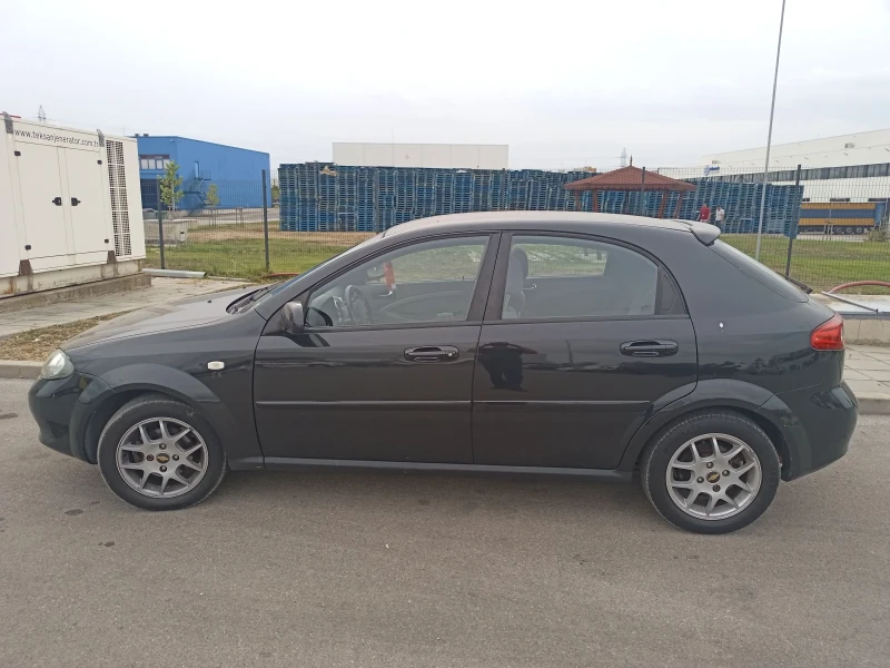 Chevrolet Lacetti 1.4 газ. инж. клима, снимка 8 - Автомобили и джипове - 47725305