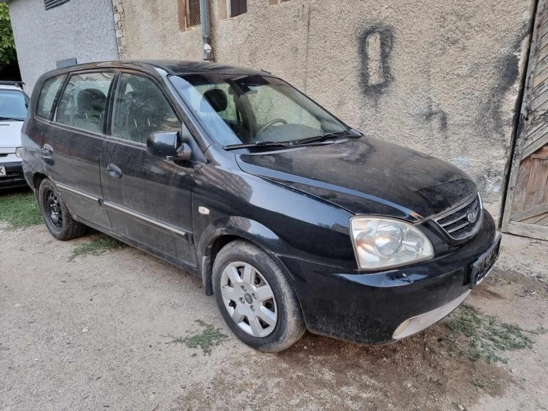 Kia Carens 2.0 CDRI, снимка 10 - Автомобили и джипове - 42228265