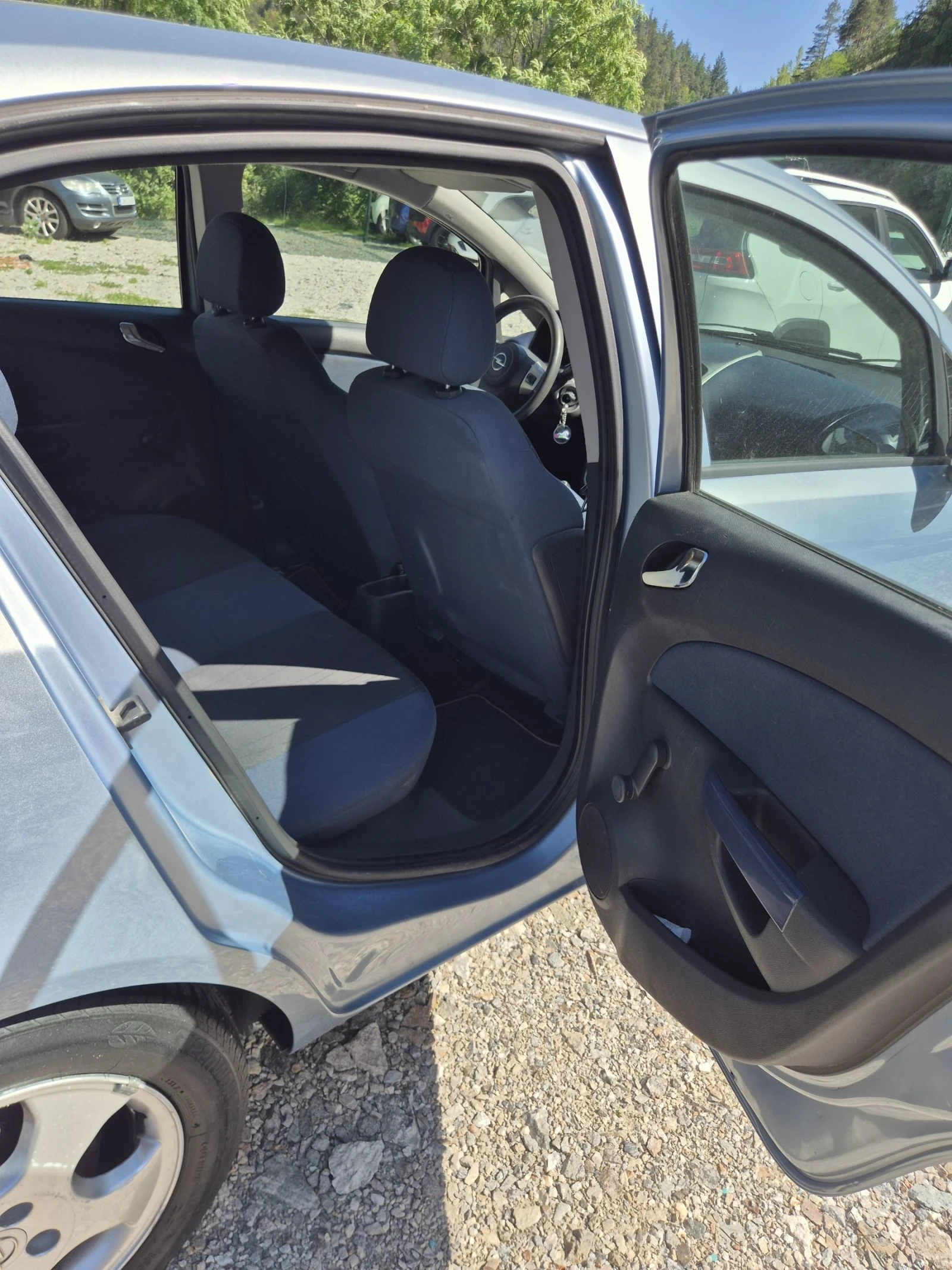 Opel Corsa, снимка 13 - Автомобили и джипове - 55103037