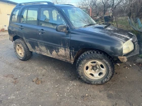     Suzuki Grand vitara 2.0. + + 