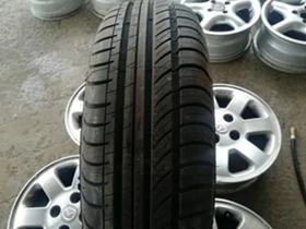 Гуми Летни 165/70R14, снимка 1
