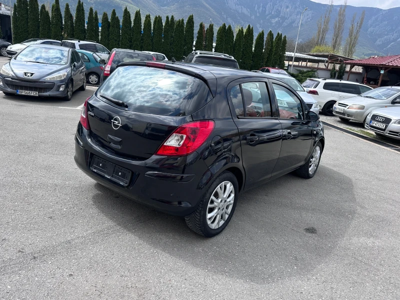 Opel Corsa ENJOY - 1.2i - КЛИМАТИК - РЕАЛНИ КИЛОМЕТРИ, снимка 5 - Автомобили и джипове - 49761899