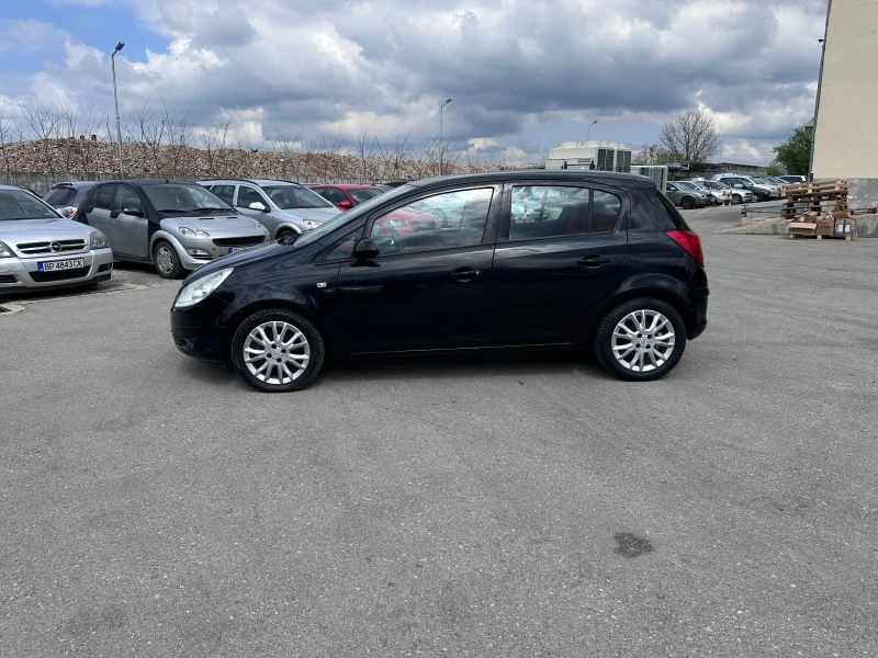 Opel Corsa ENJOY - 1.2i - КЛИМАТИК - РЕАЛНИ КИЛОМЕТРИ, снимка 8 - Автомобили и джипове - 49761899