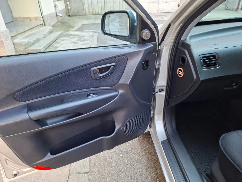 Hyundai Tucson 2.0 CRDi 16V, снимка 10 - Автомобили и джипове - 51418743