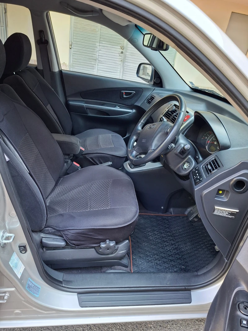 Hyundai Tucson 2.0 CRDi 16V, снимка 8 - Автомобили и джипове - 51418743