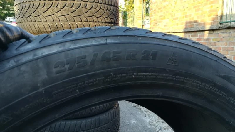 Гуми Зимни 275/45R21, снимка 8 - Гуми и джанти - 26747462