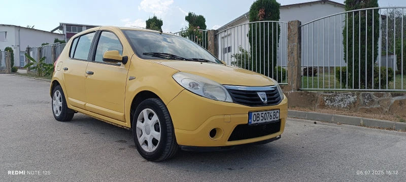 Dacia Sandero 1.4/75кс.ГАЗ* , снимка 11 - Автомобили и джипове - 53252965