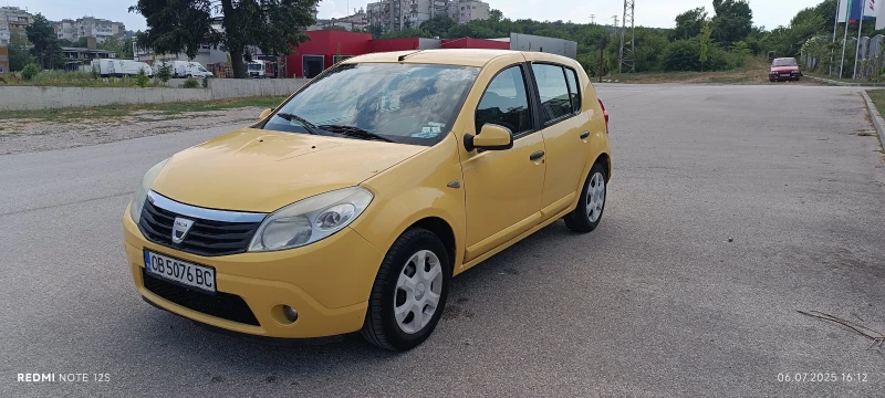 Dacia Sandero 1.4/75кс.ГАЗ* , снимка 13 - Автомобили и джипове - 53252965