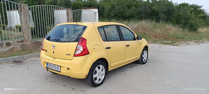 Dacia Sandero 1.4/75кс.ГАЗ* , снимка 7 - Автомобили и джипове - 53252965