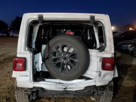 Jeep Wrangler UNLIMITED SAHARA 4XE - 36000 лв. - 44571932 5