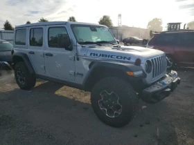 Jeep Wrangler RUBICON 4XE* Видео на мотор* CARFAX - 21646 € / 42335.90 лв. - 13689762 4