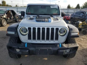 Jeep Wrangler RUBICON 4XE* Видео на мотор* CARFAX - 21646 € / 42335.90 лв. - 13689762 5
