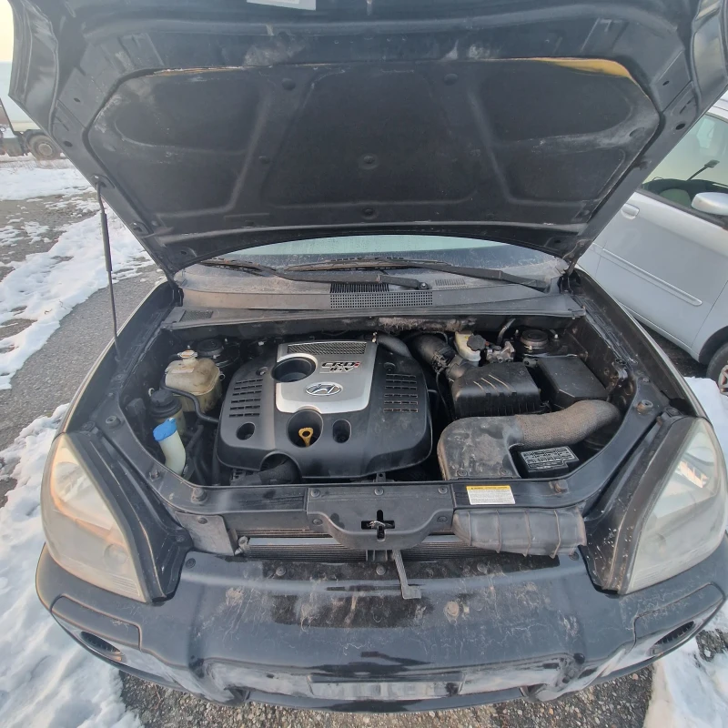 Hyundai Tucson 2.0, снимка 14 - Автомобили и джипове - 48708098