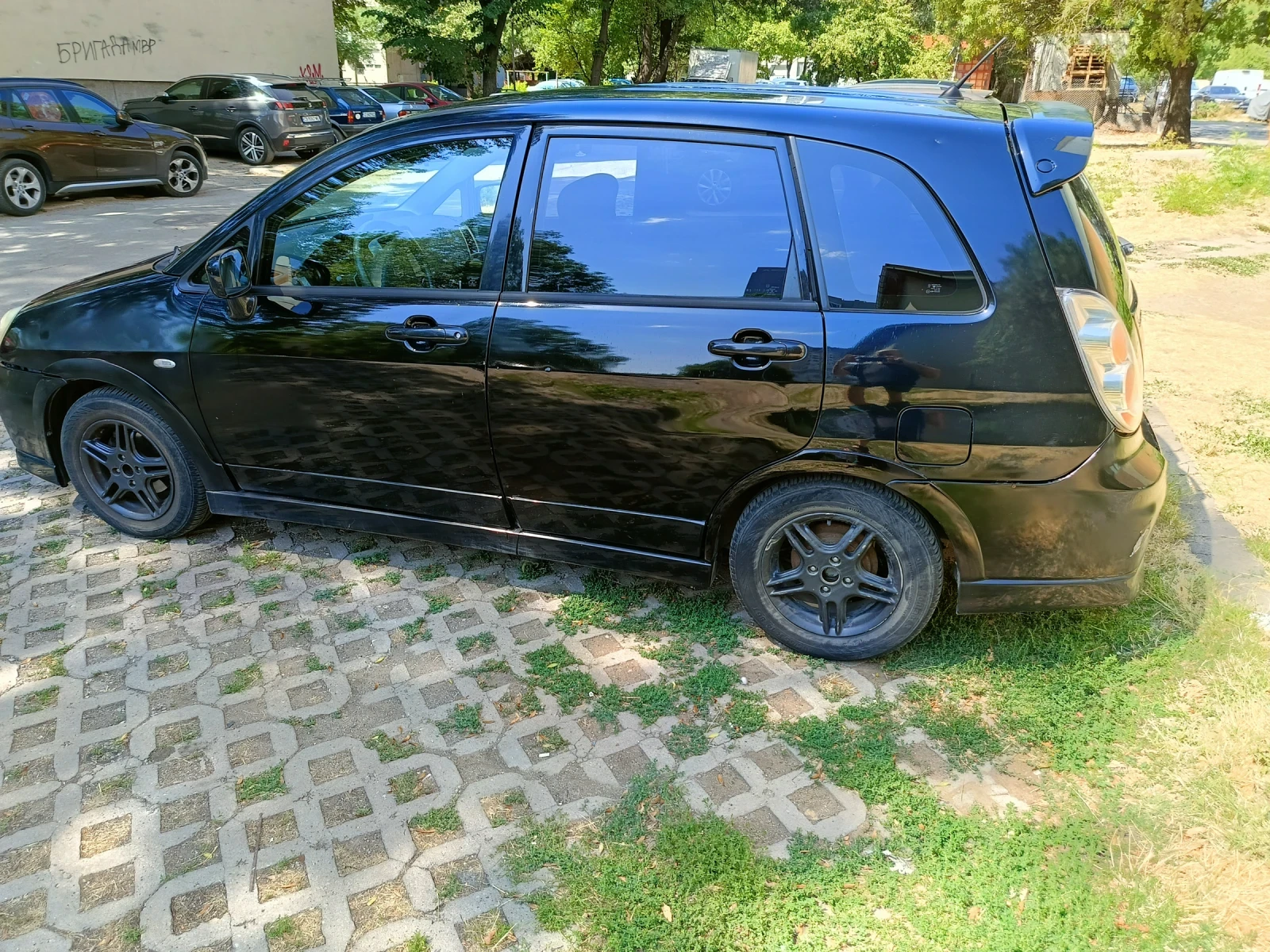 Suzuki Liana  - изображение 9