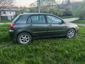 Toyota Corolla 1.6 i, снимка 9