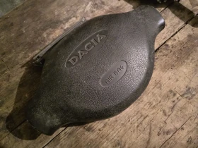 продавам части от Дачия Логан 1.5 ДСИ,2007г.в добро състояние,86к.с., снимка 16
