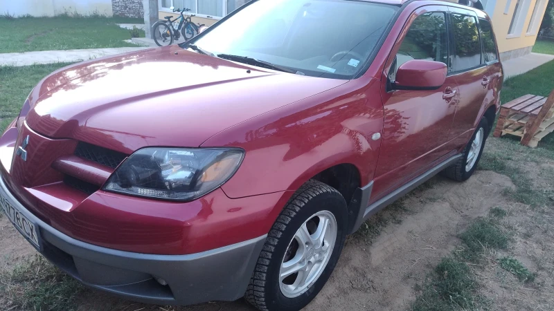 Mitsubishi Outlander, снимка 11 - Автомобили и джипове - 47005658