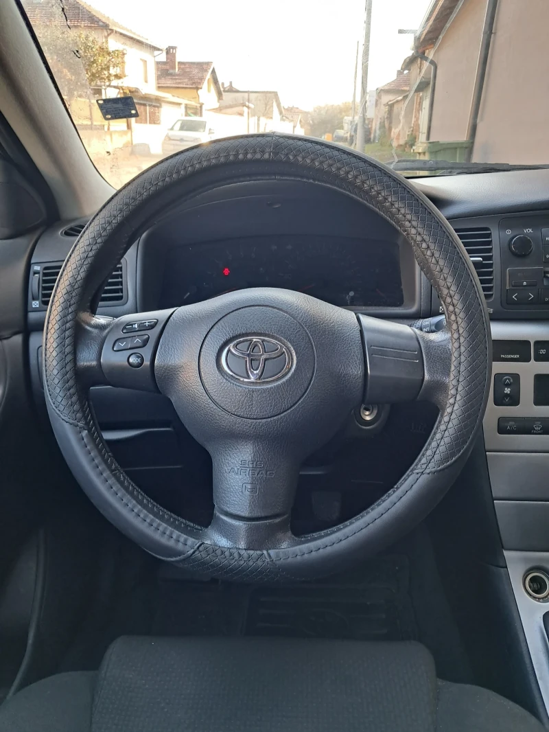 Toyota Corolla 1, 6 110 к.с., снимка 10 - Автомобили и джипове - 47911658