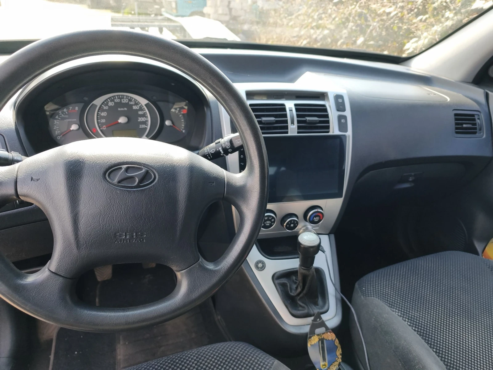 Hyundai Tucson 2.0 140кс, снимка 6 - Автомобили и джипове - 53859031