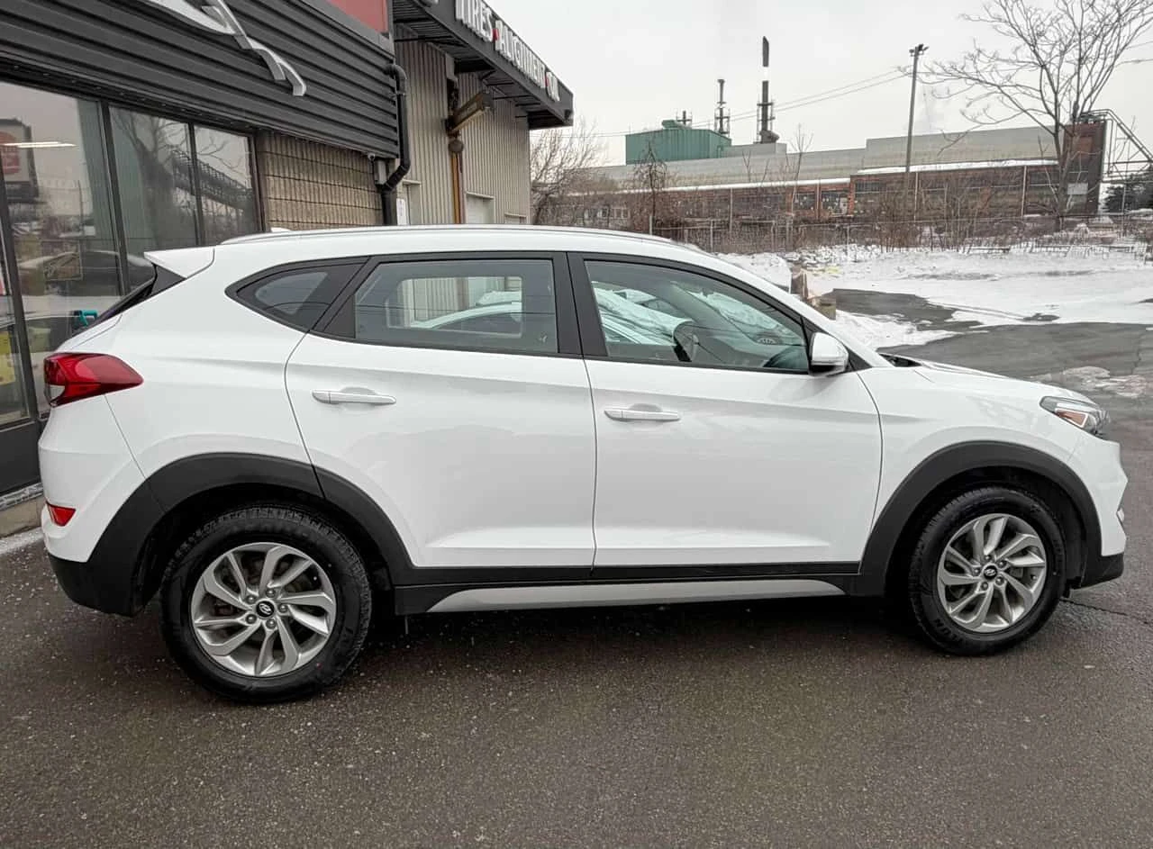 Hyundai Tucson * Premium * CARFAX * БЕЗ ИНЦИДЕНДИ * АВТОКРЕДИТ, снимка 3 - Автомобили и джипове - 55475229