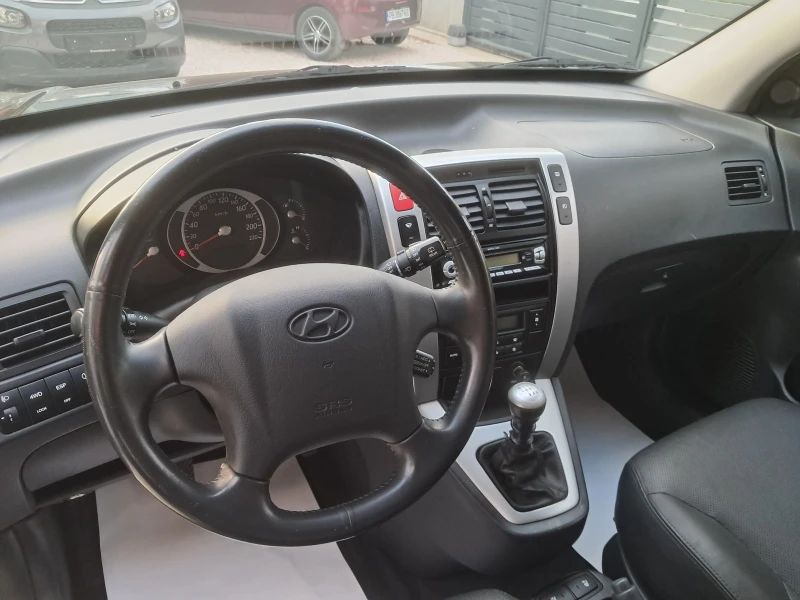 Hyundai Tucson -104000 км., снимка 11 - Автомобили и джипове - 52882143