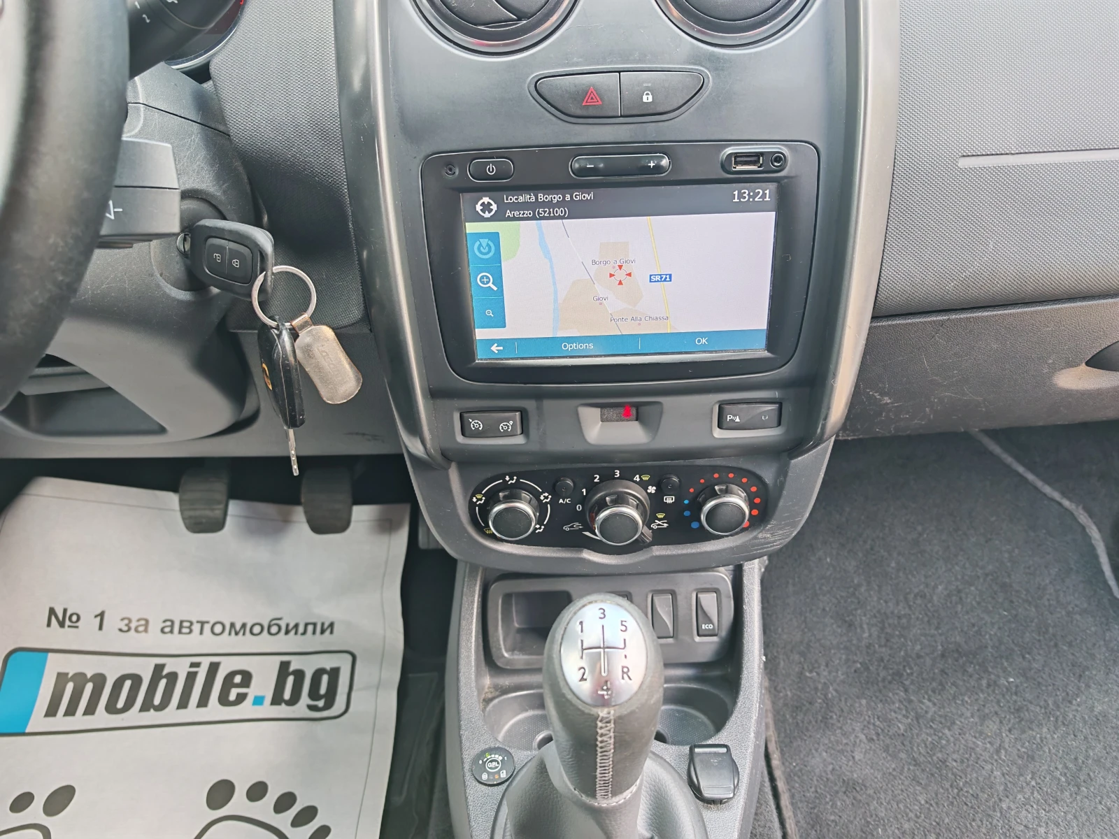 Dacia Duster 1.6-ГАЗ-НАВИ-КАМЕРА, снимка 12 - Автомобили и джипове - 56655780