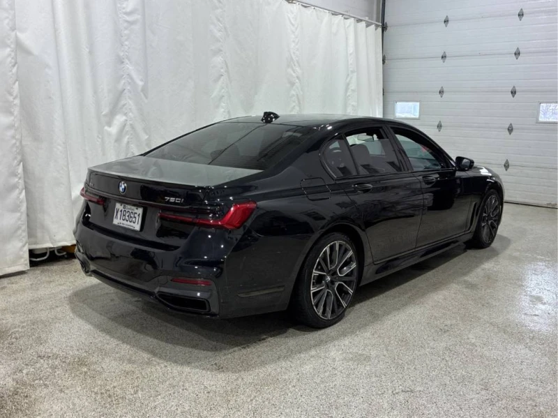 BMW 750 CARFAX* INDIVIDUAL* M-PACK* DISTRONIC* DIGITAL KEY, снимка 4 - Автомобили и джипове - 53498753