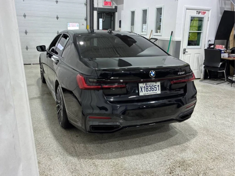 BMW 750 CARFAX* INDIVIDUAL* M-PACK* DISTRONIC* DIGITAL KEY, снимка 5 - Автомобили и джипове - 53498753