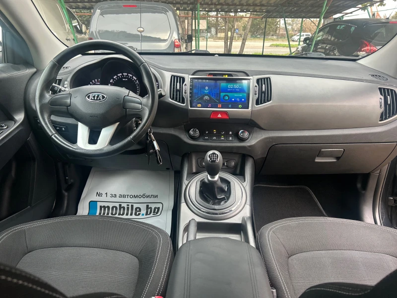 Kia Sportage 1.6i-135k.c-НАВИ-КАМЕРА-CARPLAY!