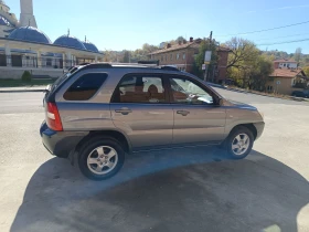 Обява за продажба на Kia Sportage 2.0crd 4x4 ~5 699 лв. - изображение 5 | Auto.bg Обява за продажба на Kia Sportage 2.0crd 4x4 ~5 699 лв. - изображение 5