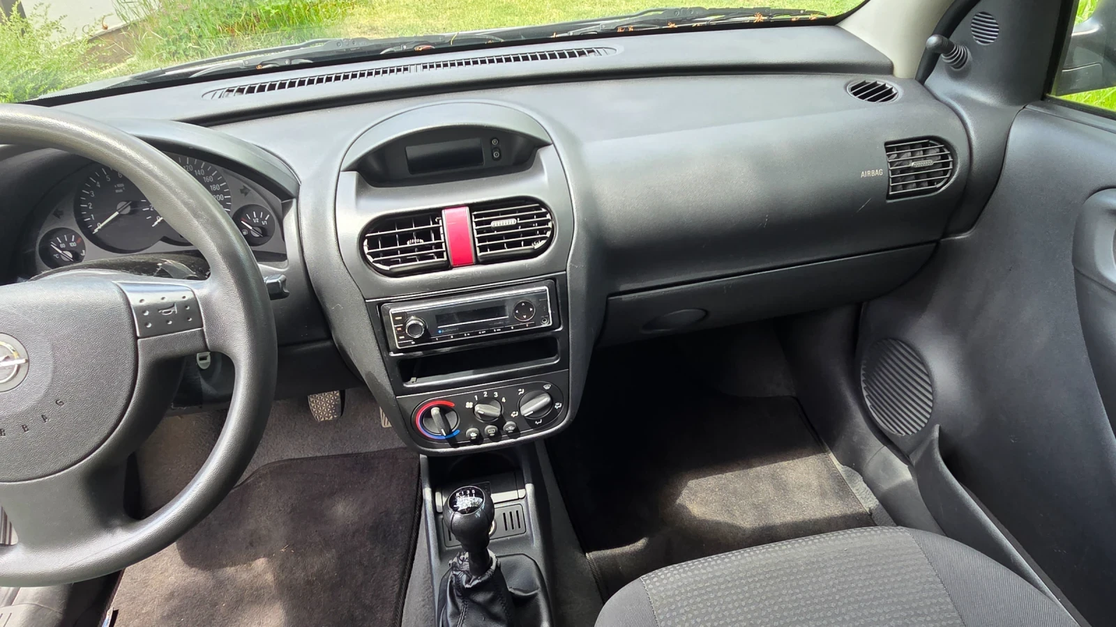 Opel Corsa 1.2 70к.с, снимка 10 - Автомобили и джипове - 54621436