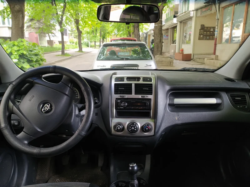 Kia Sportage, снимка 11 - Автомобили и джипове - 49482616