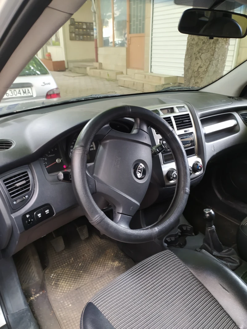 Kia Sportage, снимка 14 - Автомобили и джипове - 49482616